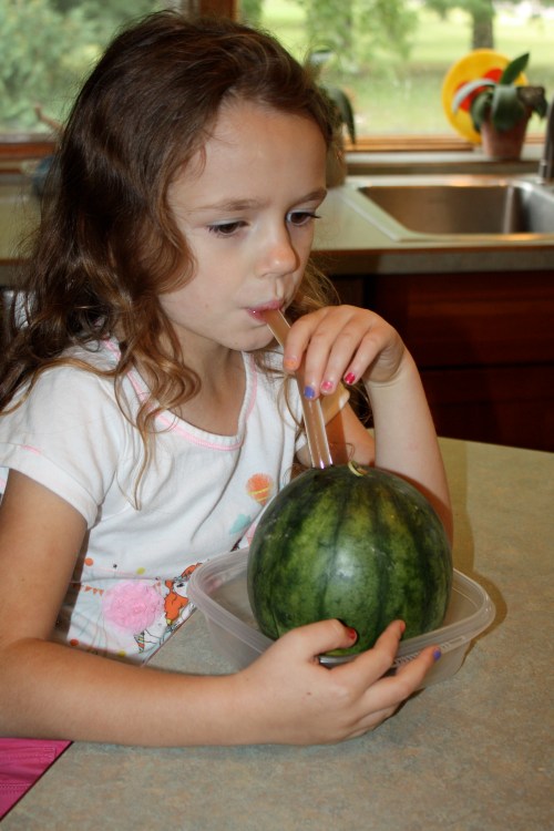 Maeve drinking her watermelon juice.